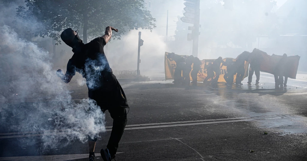 Protesters clash with police in Geneva ahead of G7 summit in France