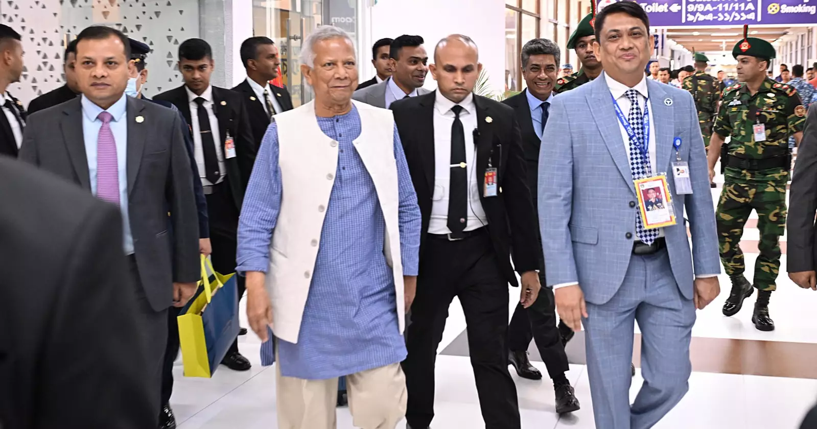 Prof Yunus returns home from London