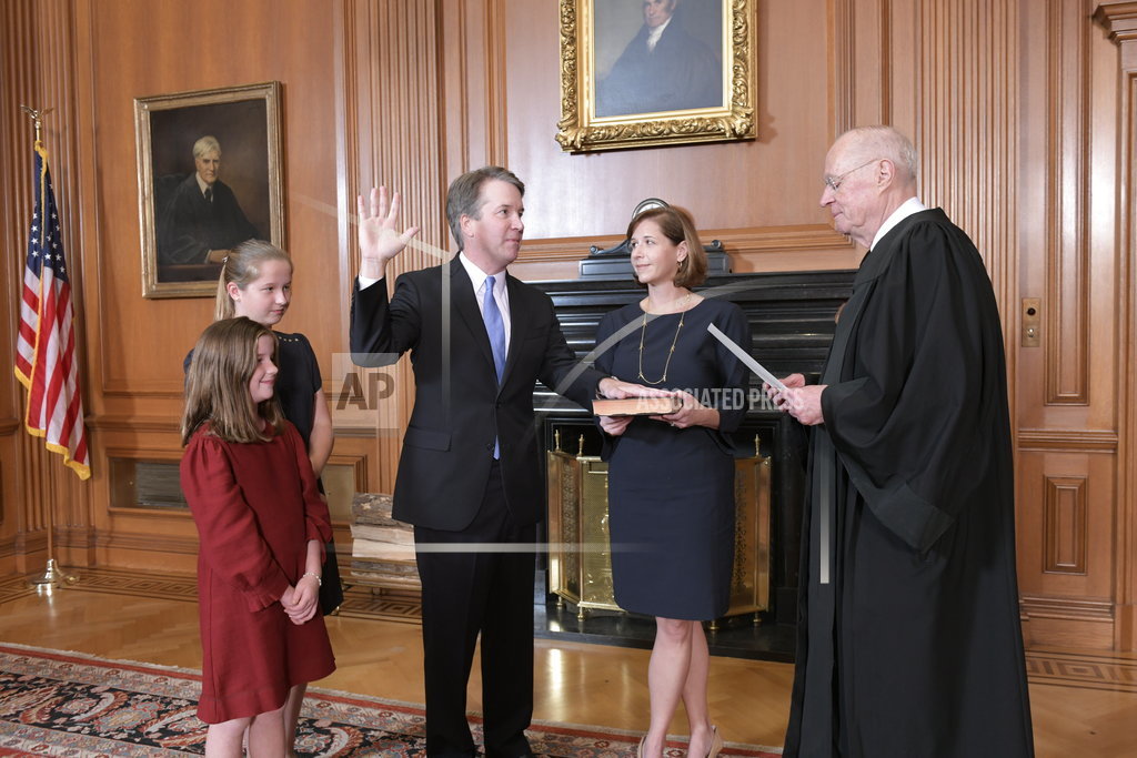 Kavanaugh sworn to high court after rancorous confirmation
