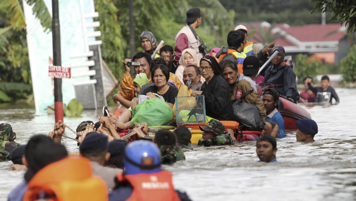 Landslides, flooding from dam kill 8 in central Indonesia