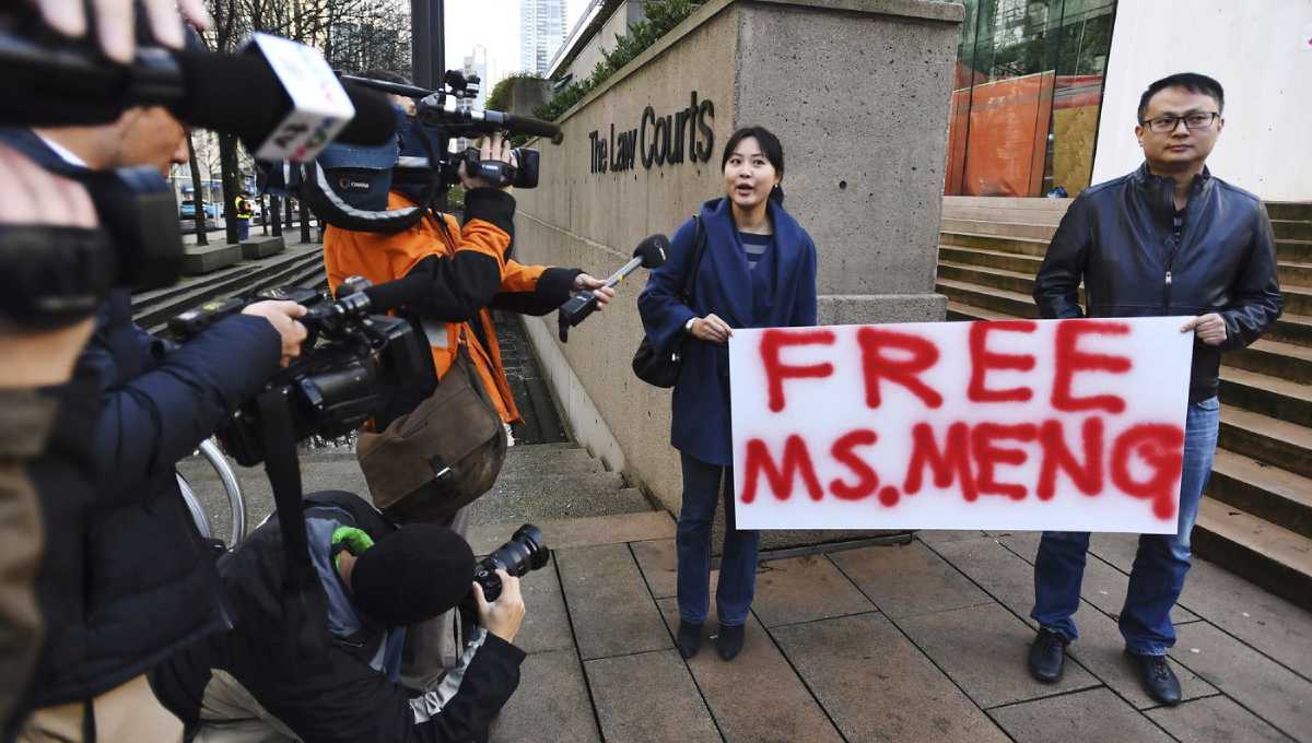 China ups pressure as tech exec's hearing goes into Tuesday