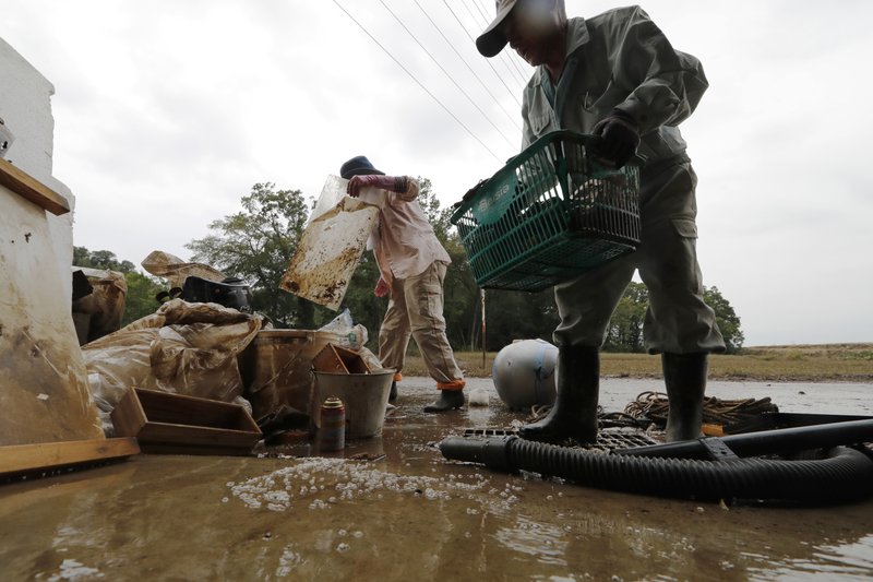 Japan storm victims felt worst had passed, then floods came