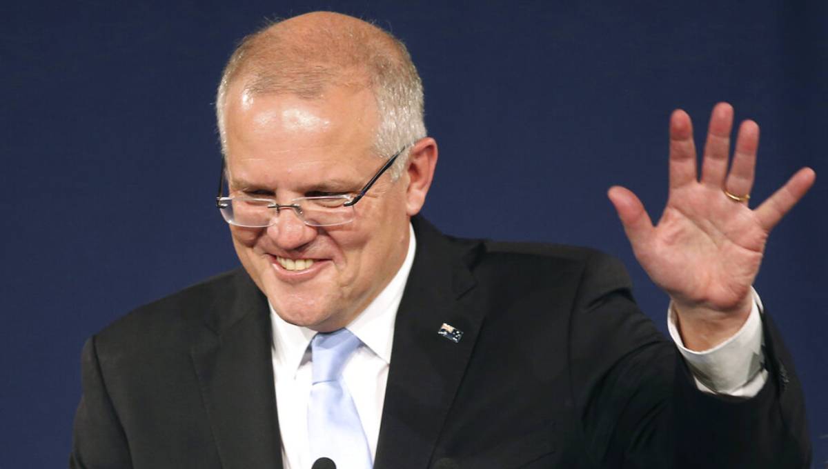 Australia's leader vows to get back to work after shock win