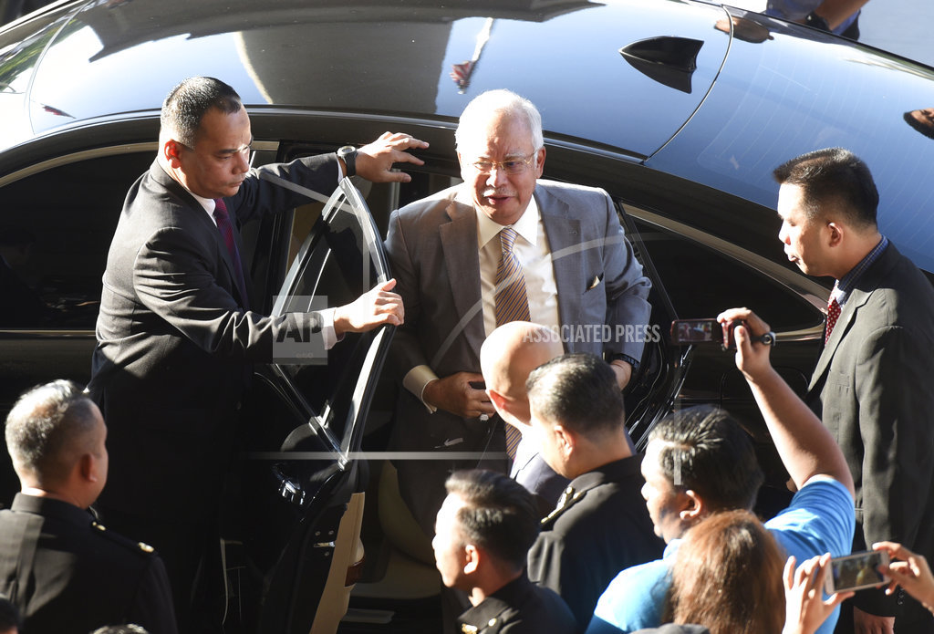 Malaysia ex-PM, ex-treasury, spy chiefs charged with graft