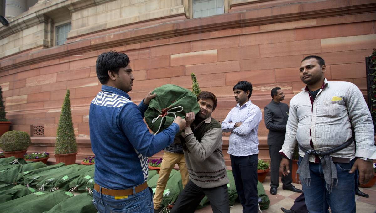 India budget announces handouts for poor farmers, workers