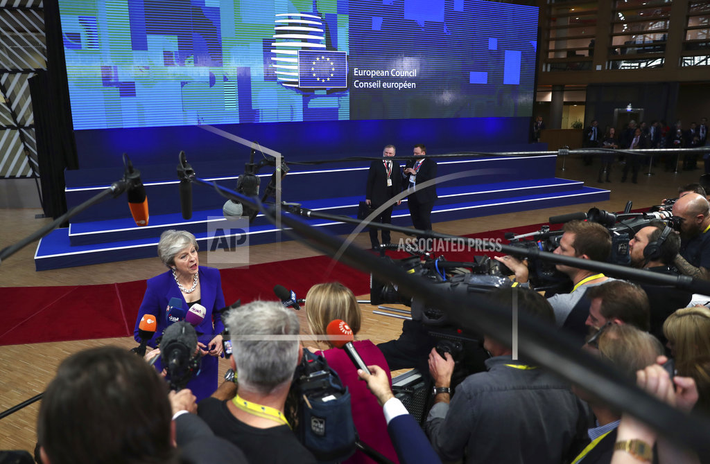 May says Brexit transition era could grow, angers many in UK