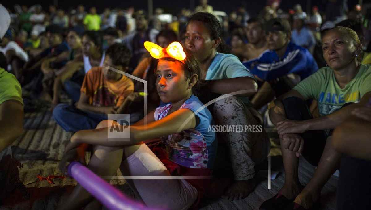 No buses for now, weary caravan migrants set to resume march