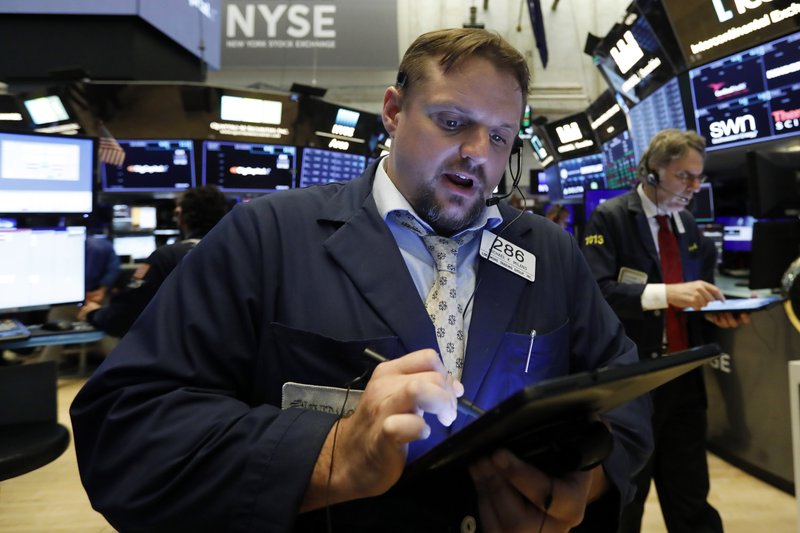 Asian stocks mostly lower after retreat on Wall Street