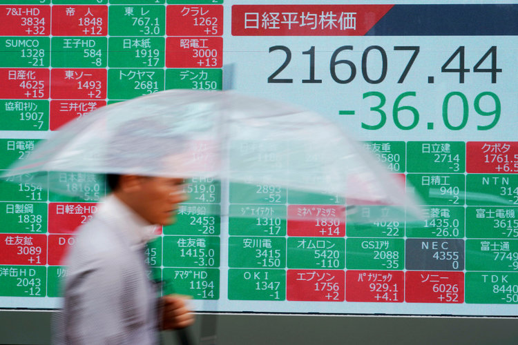 Asian shares mostly higher after Wall St sets new records