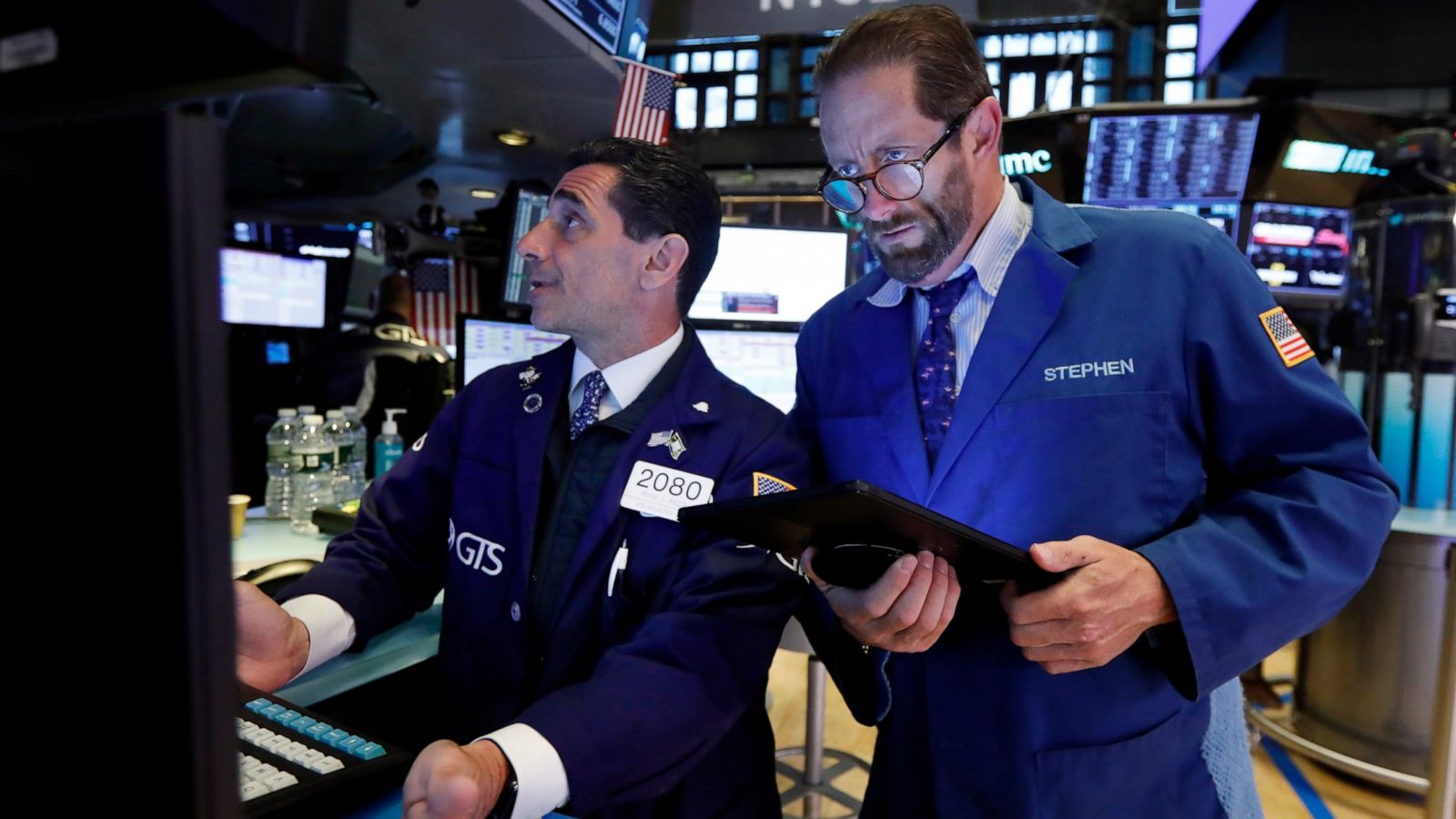 Asian markets wobble as US, China trade jibes over trade