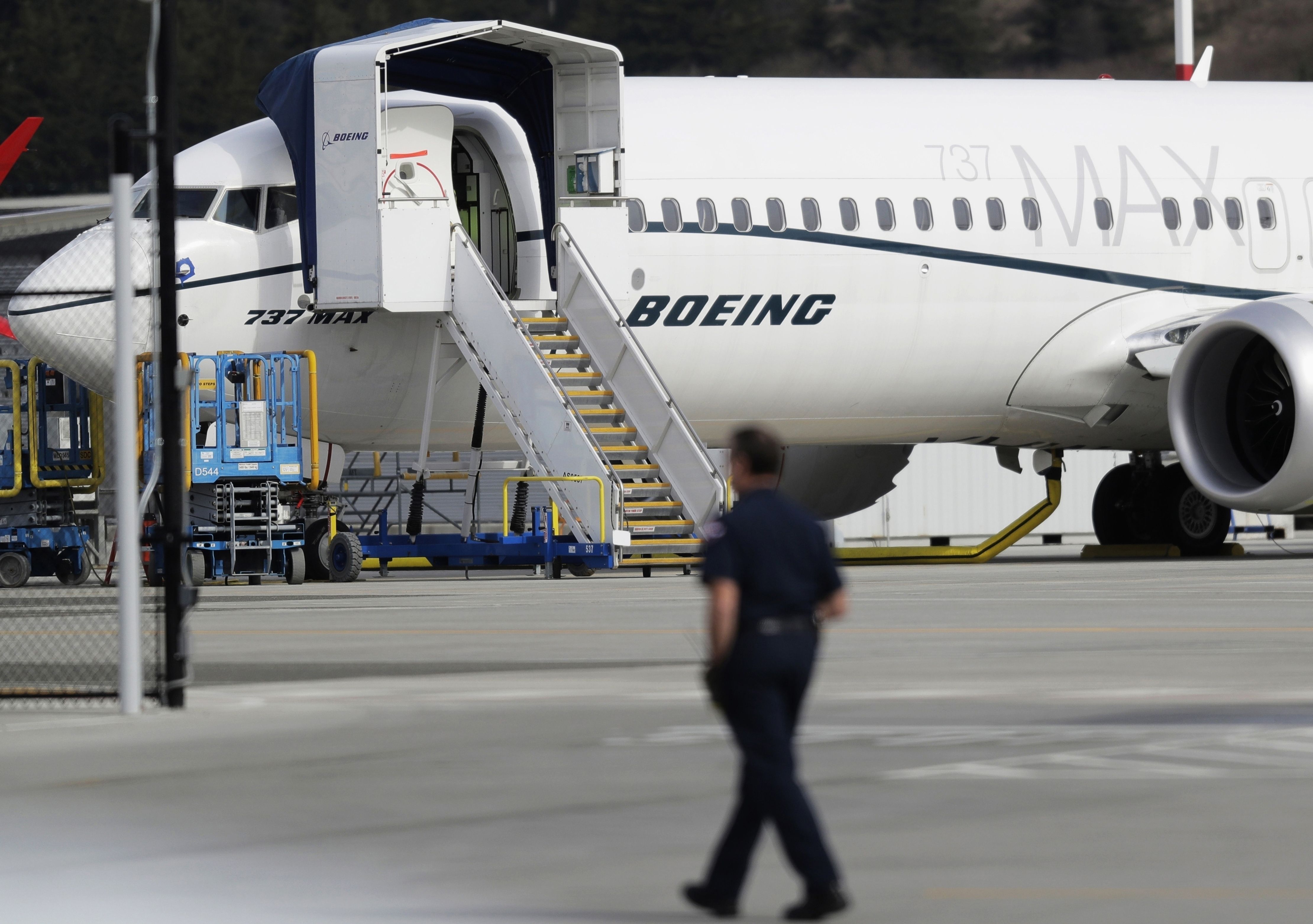 Boeing to take a $4.9 billion charge over grounded jet