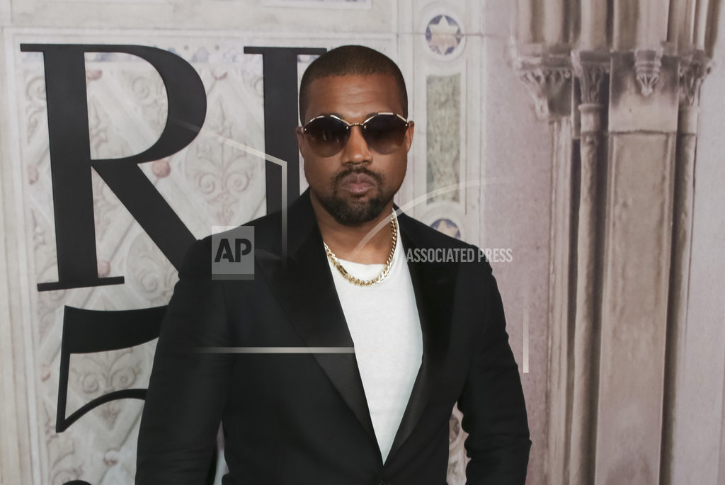 Kanye West meets Uganda's president, gifts pair of sneakers