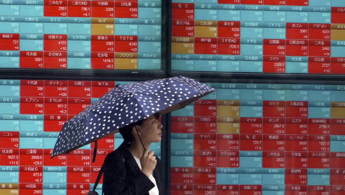 World shares mostly higher after Wall St sets new records