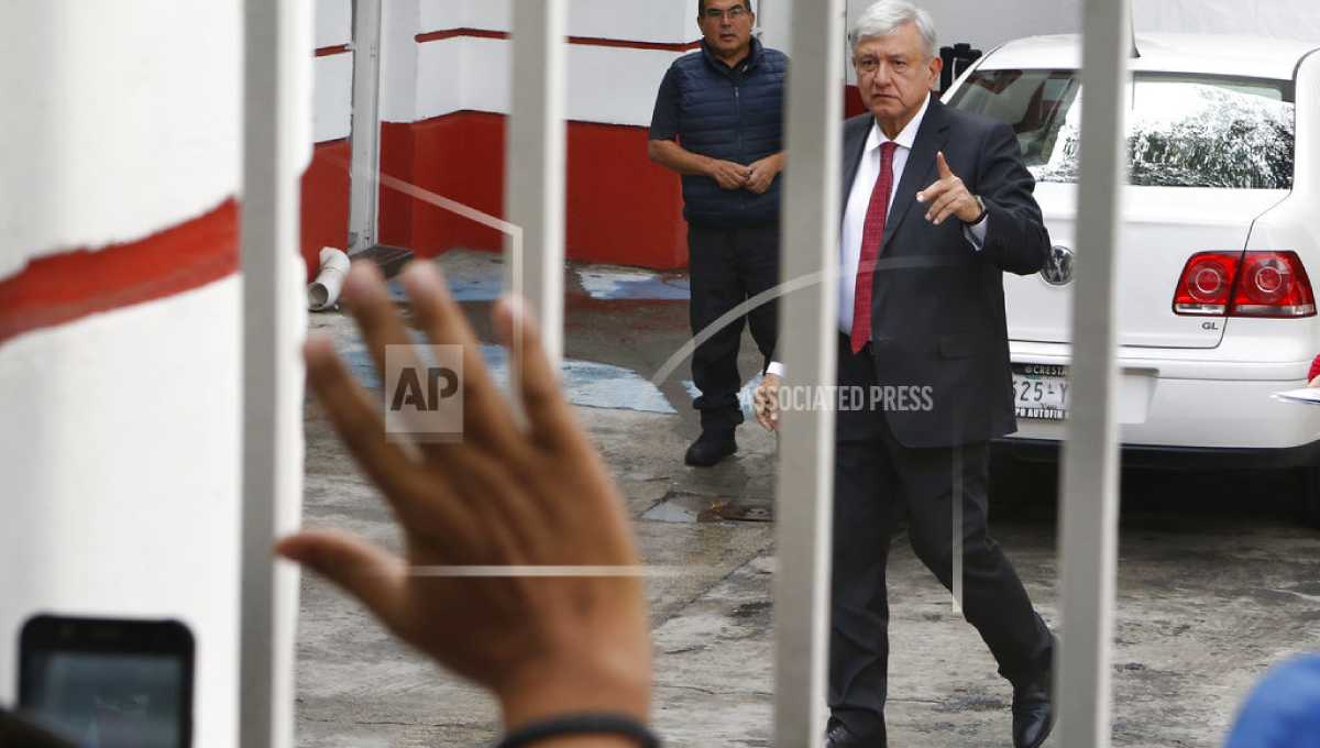 Victim families confront Mexico president-elect over amnesty