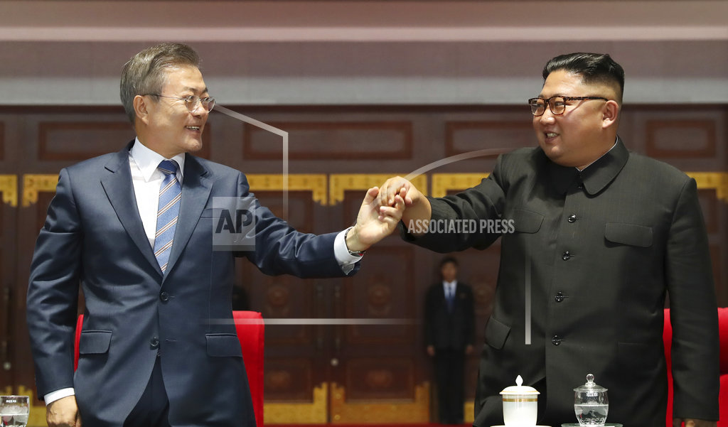 Kim, Moon head to North Korea's sacred volcano on final day