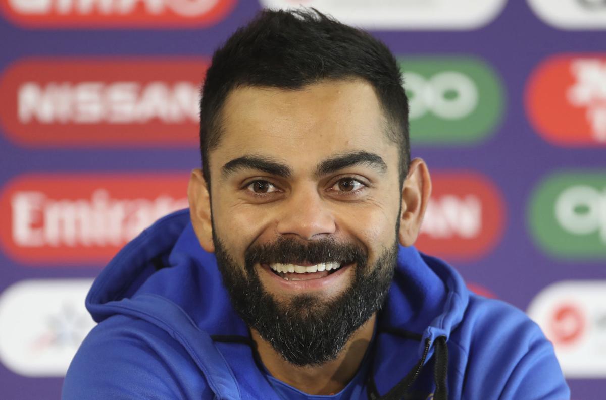 Superstar Kohli working in the shadows at Cricket World Cup