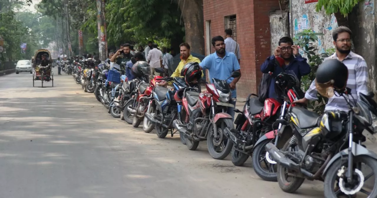Even after price hike, fuel stations in Dhaka see long queues under intense heat