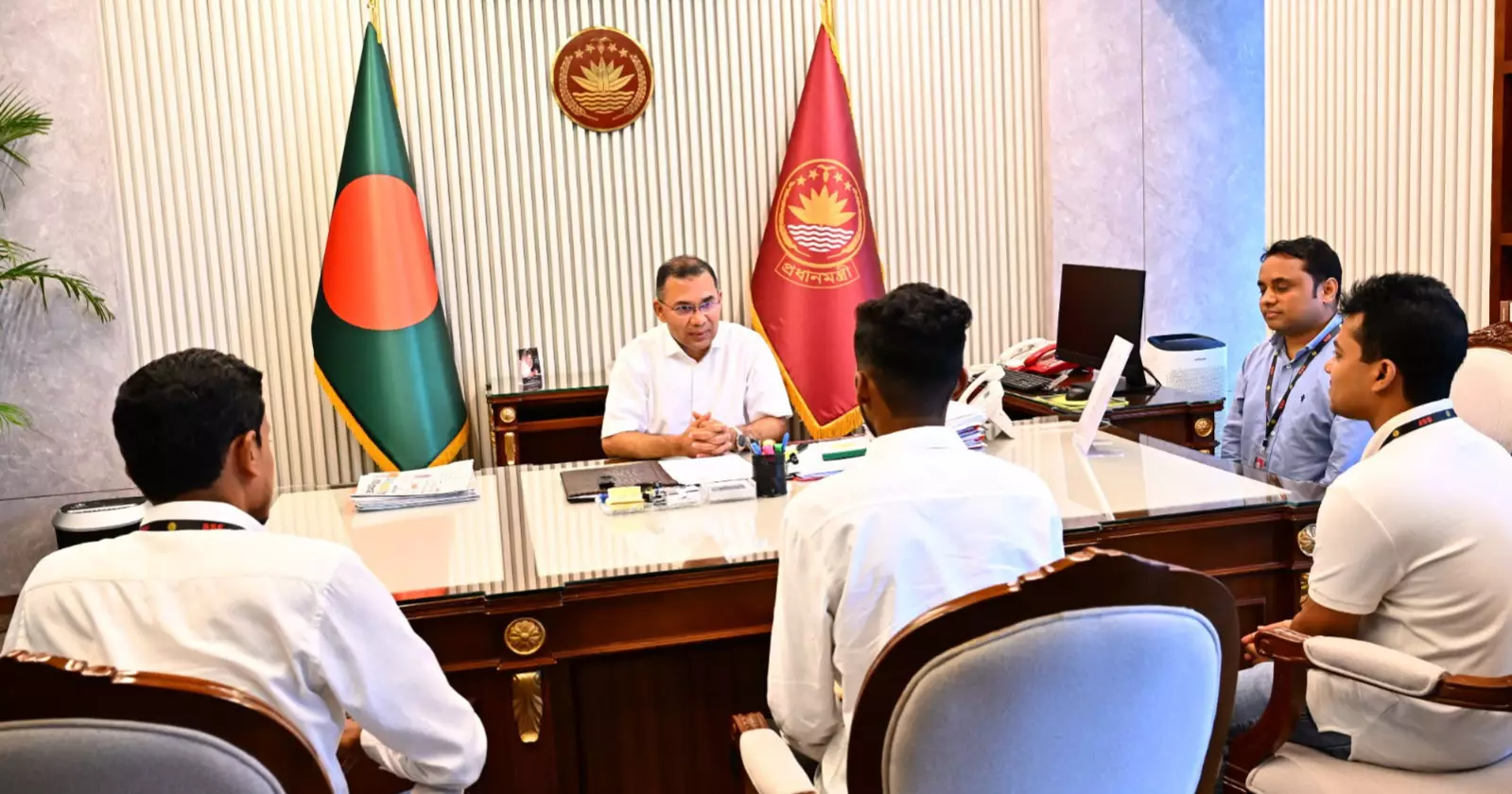 Long-held wish comes true as July uprising survivor presents blood-stained flag to PM