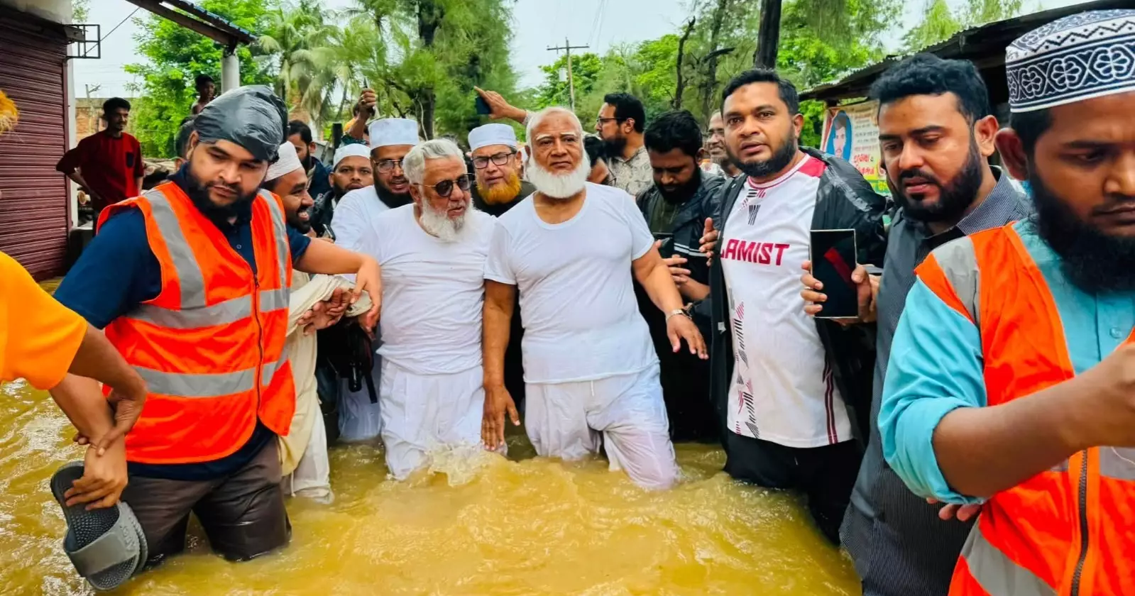 Opposition leader visits flood-hit Chattogram, distributes relief