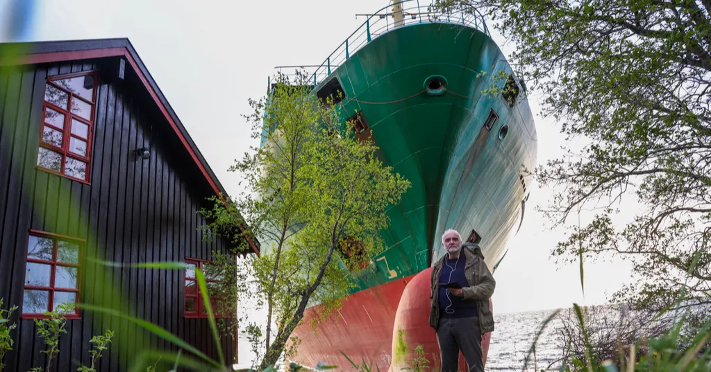 Norwegian man awoke to find a grounded cargo ship narrowly missed his home
