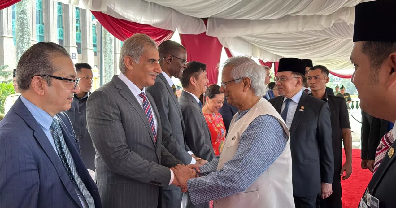 Malaysian PM Anwar Ibrahim receives Prof Yunus at Putrajaya as red carpet rolls out