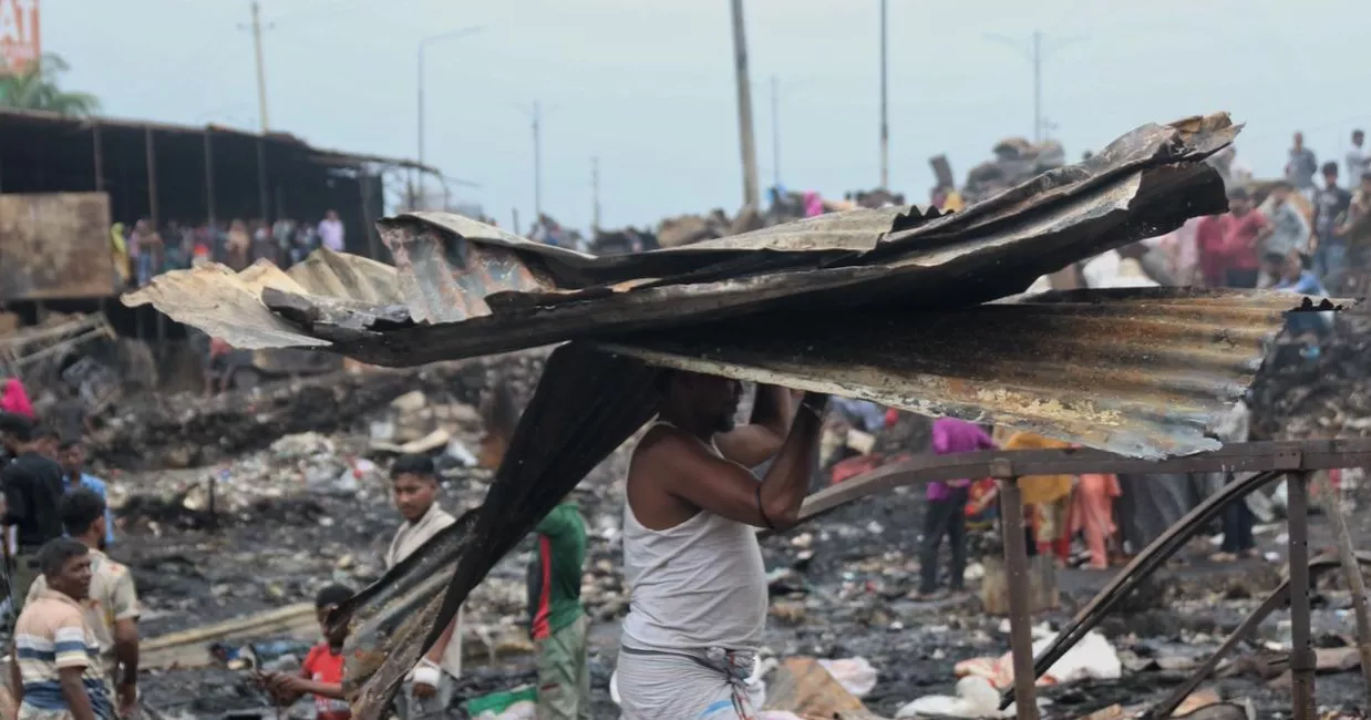Day after blaze, Kalshi slum residents cling to what little remains