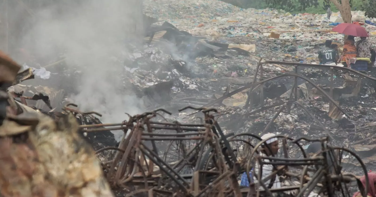 Day after blaze, Kalshi slum residents cling to what little remains