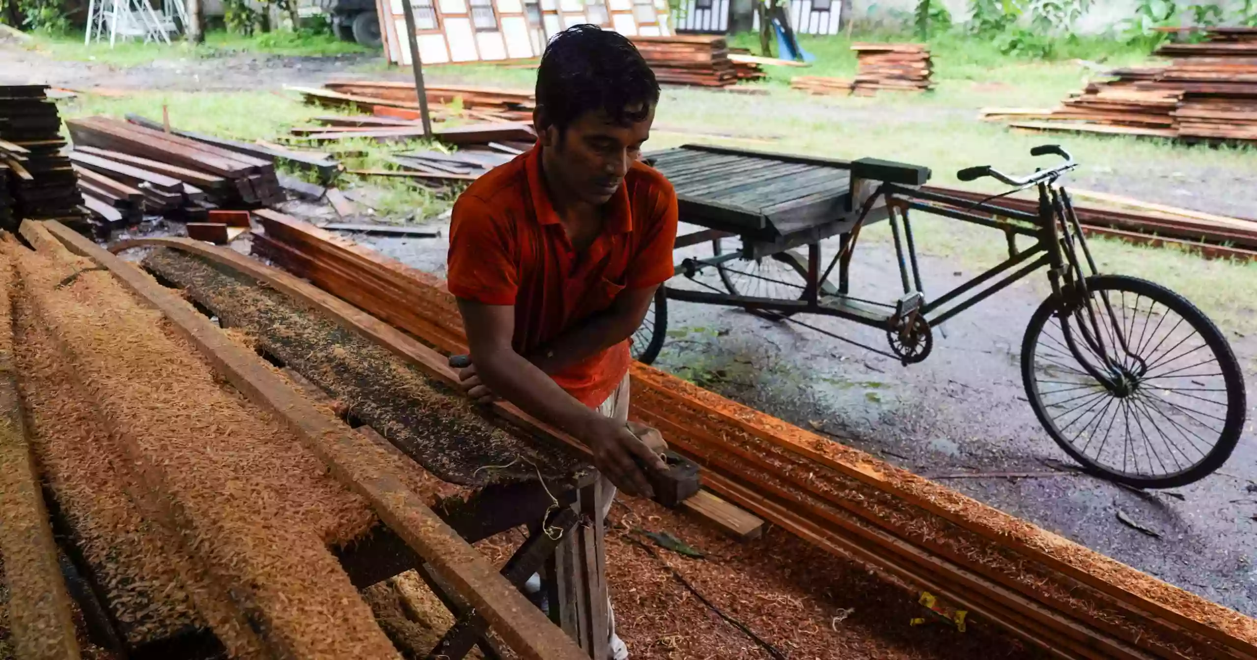 As rivers swallow villages, one wooden house keeps hope afloat