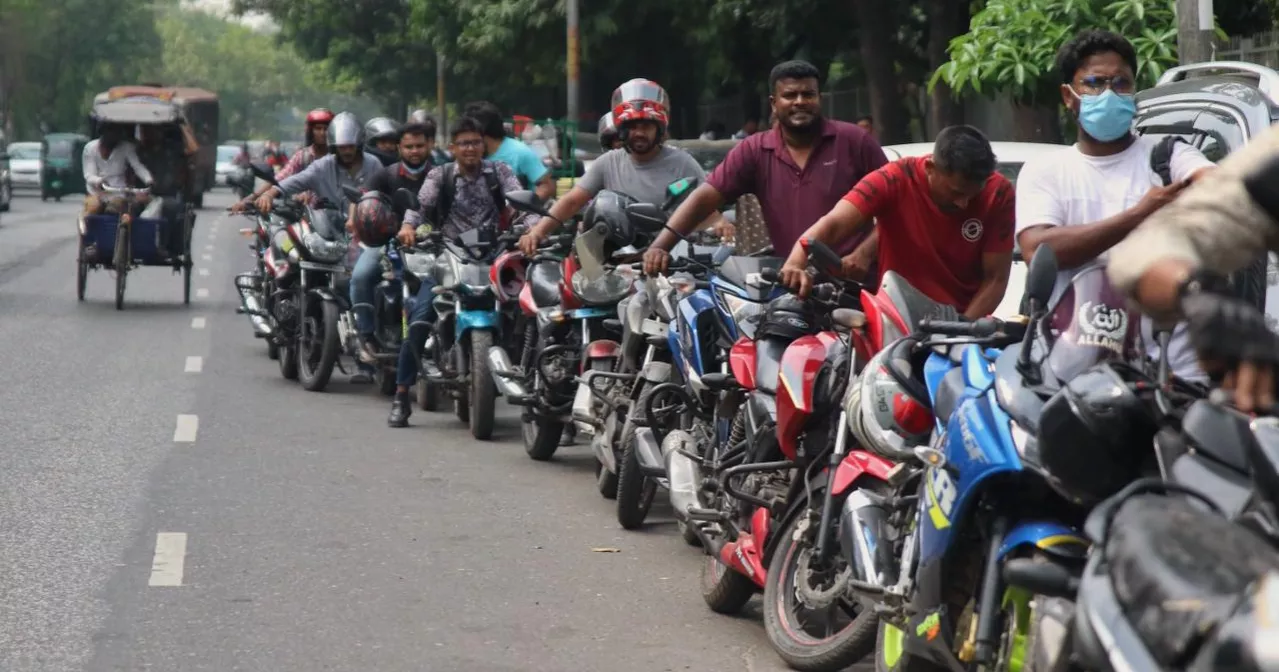 Even after price hike, fuel stations in Dhaka see long queues under intense heat