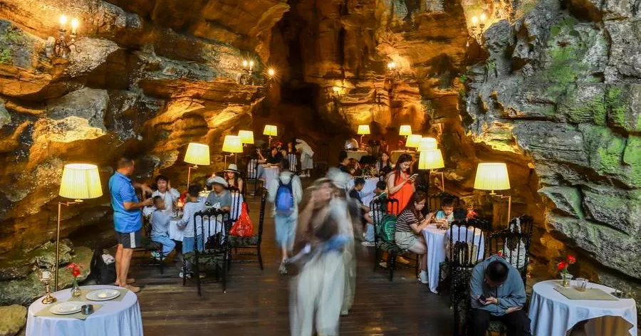 From cave exploration to cafes, China's karst 'cool resources' fuel summer tourism
