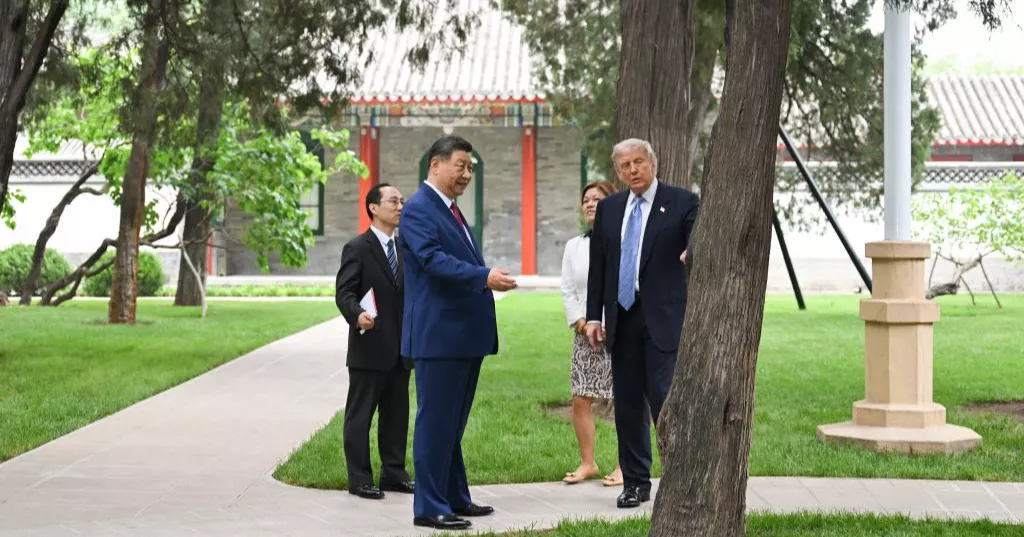 Xi, Trump hold private meeting in Beijing