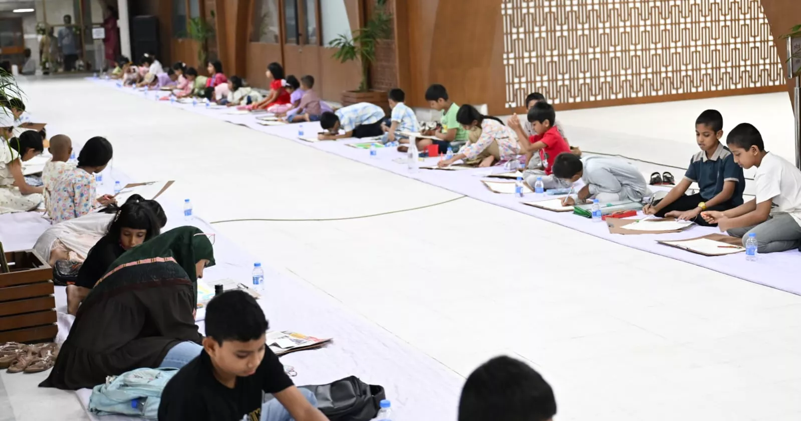 Children paint spirit of July at Parliament Secretariat competition