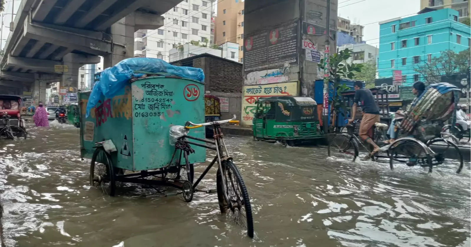 Commuters suffer as downpour leaves Dhaka streets waterlogged