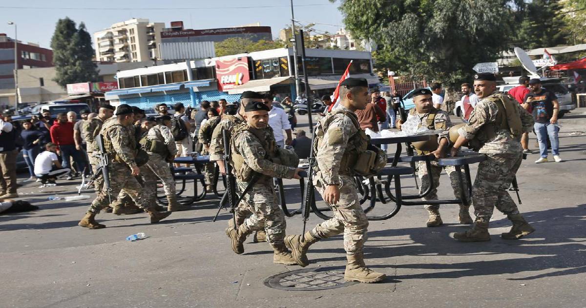 Lebanese troops open roads closed by protesters