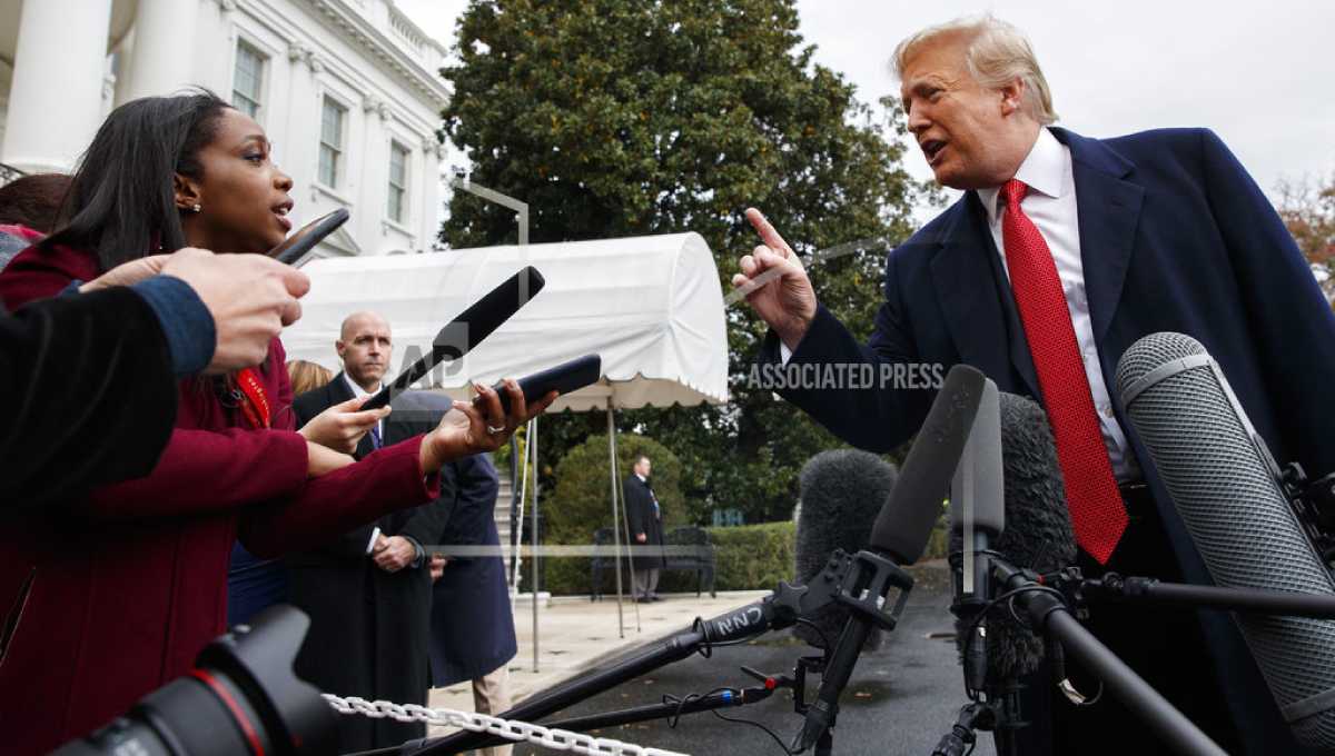 Trump insults reporters, claims Acosta video wasn't altered