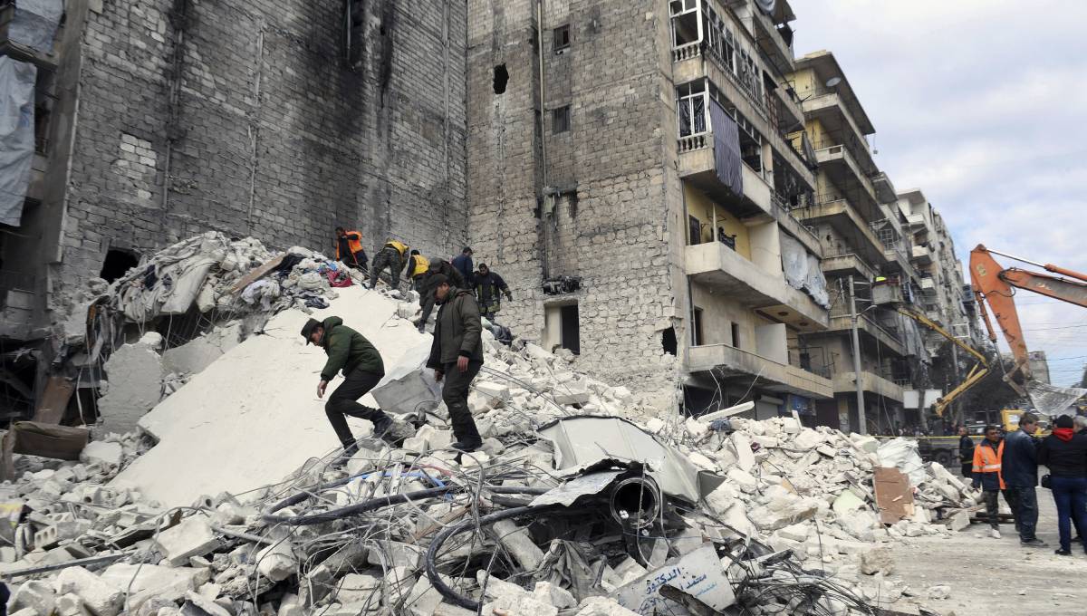 Building collapses in Syria's Aleppo killing 11