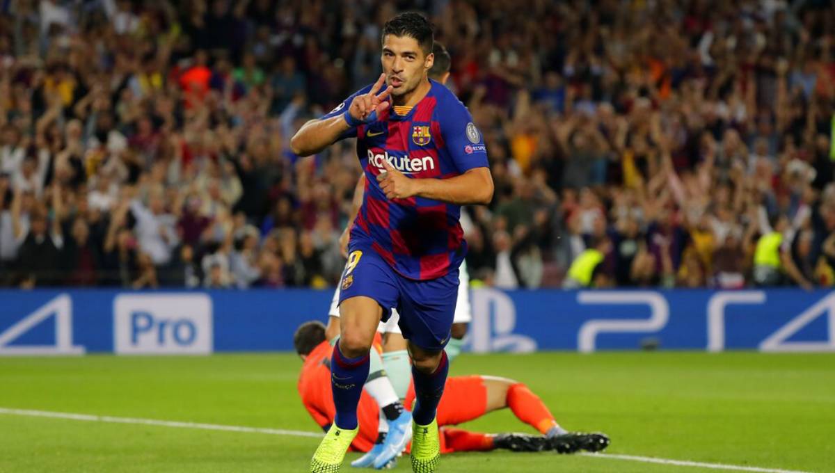 Suarez scores 2 to give Barca 2-1 comeback win over Inter
