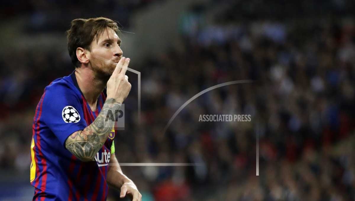 Messi double helps Barcelona to 4-2 win at Tottenham