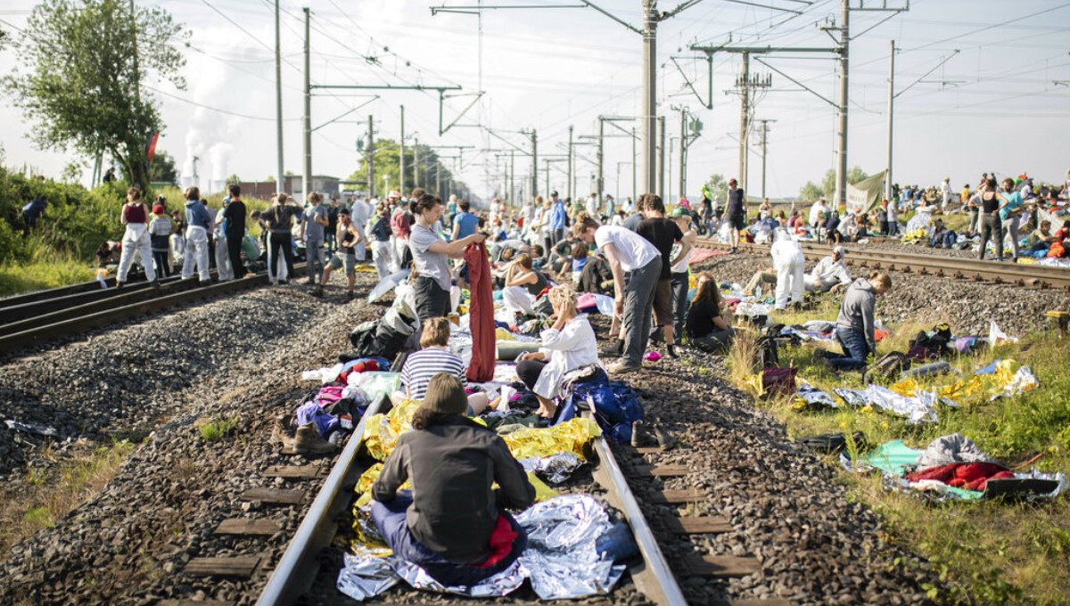 Thousands join climate protests in western Germany