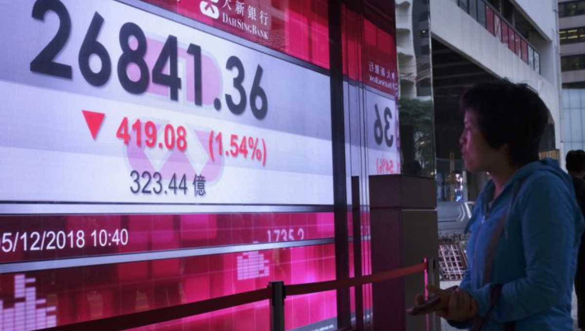 Asian shares skid as Huawei CFO arrest revives trade jitters