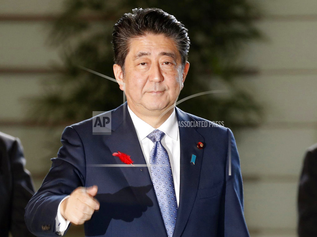 Japan's PM reshuffles Cabinet; foreign, trade ministers stay