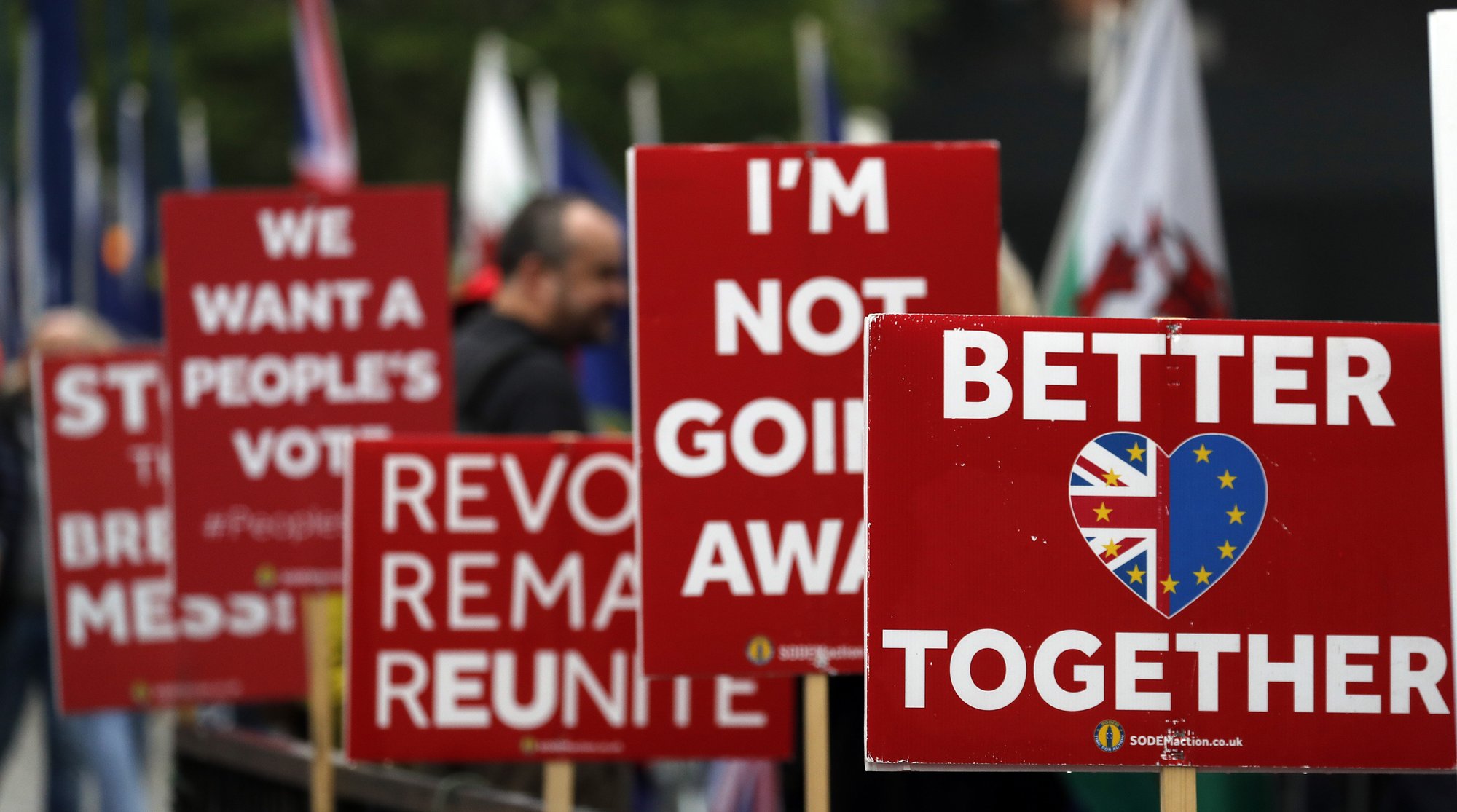 German official demands Brexit progress as May seeks delay