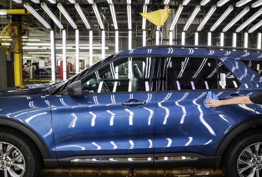 Ford 2Q profit falls, says more restructuring charges coming