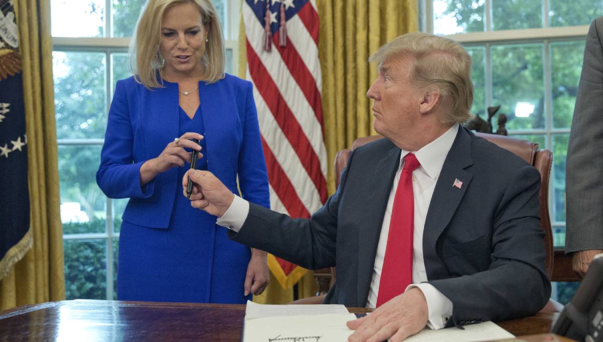 Trump tries to deflect blame for migrant children's deaths