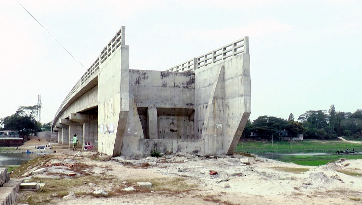 Tk 14 cr bridge with no approach road lies useless in B’baria 